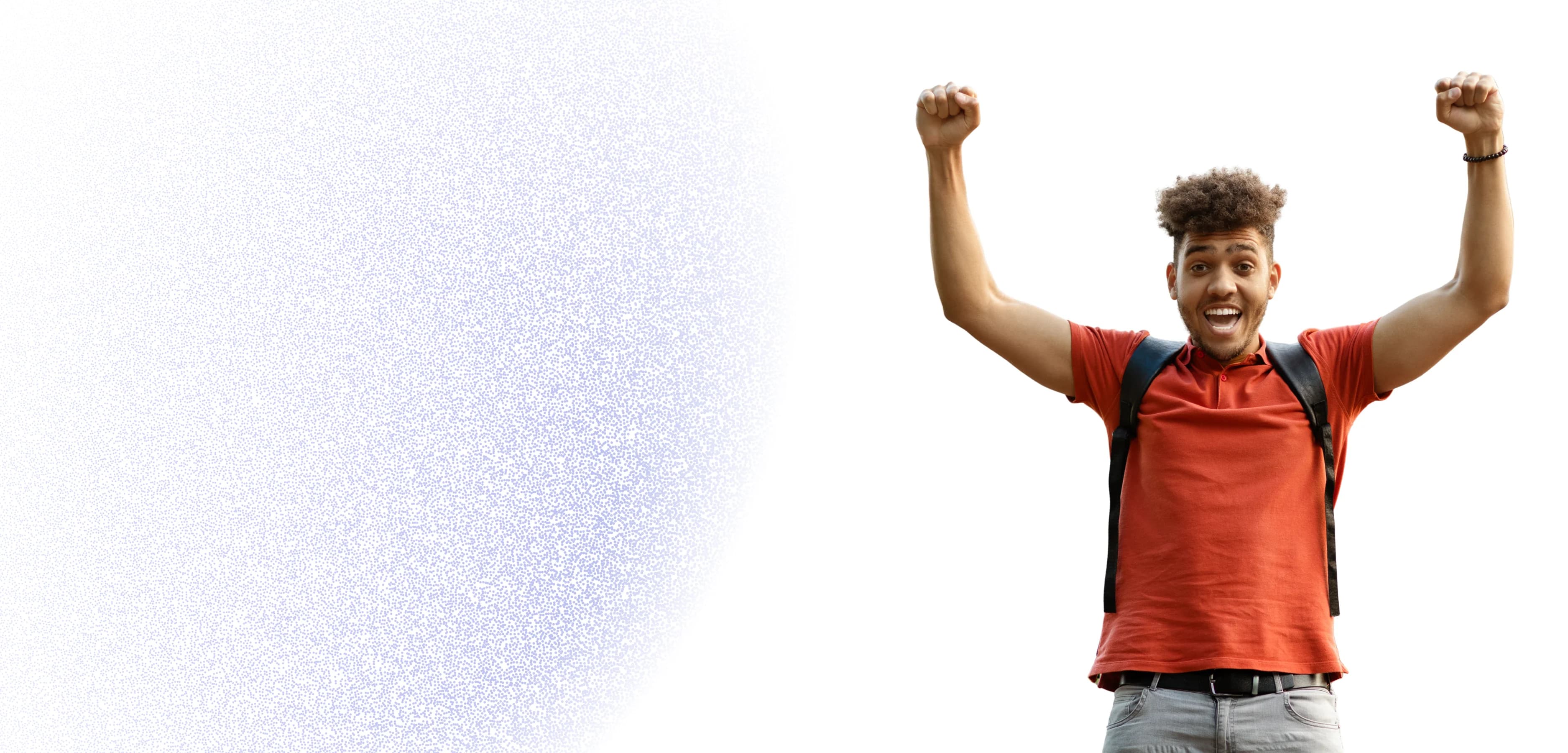 A student celebrating with both fists raised in the air